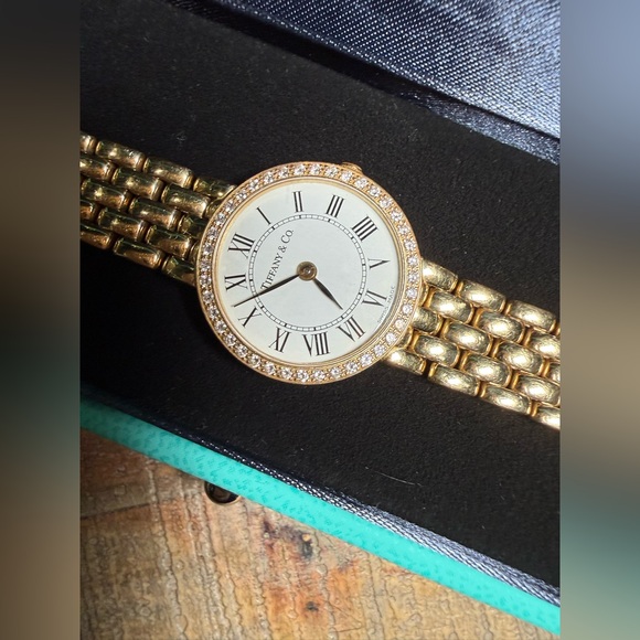 Vintage Tiffany & Co. ladies 14k yellow gold watch with diamonds around bezel. - Picture 9 of 12